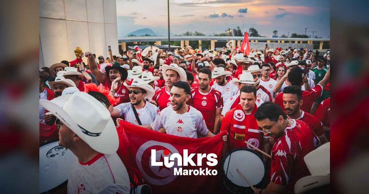 Supporters van het Marokkaanse voetbalelftal juichen in een stadion